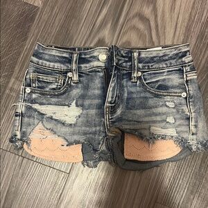 Distressed Denim Shorts with Lace Pockets